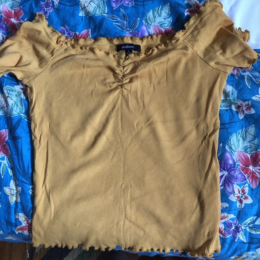 A cute yellow off the shoulder shirt